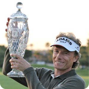 Bernhard Langer holding the Hoag Classic trophy