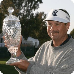 Brad Bryant holding the Hoag Classic trophy