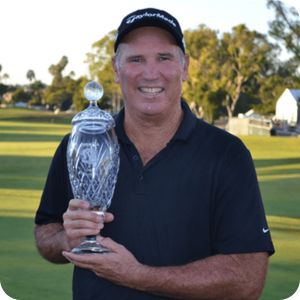 Duffy Waldorf holding the Hoag Classic trophy