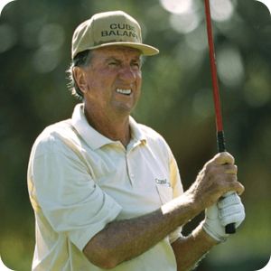 George Archer holding a golf club