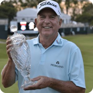 Jay Haas holding the Hoag trophy