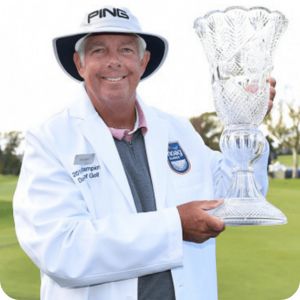 Krik Triplett holding the Hoag trophy
