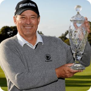 Loren Roberts holding the Hoag Classic trophy