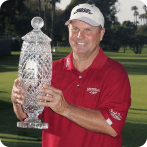 Mark Johnson holding the Hoag Classic trophy