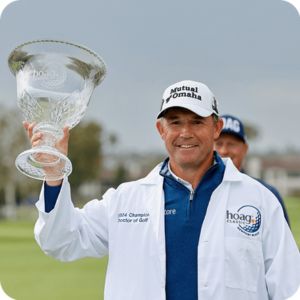 Padraig Harrington holding the Hoag trophy