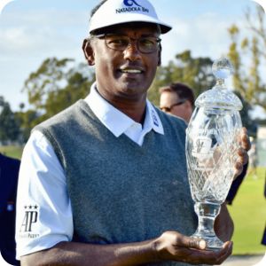 Vijay Singh holding the Hoag trophy